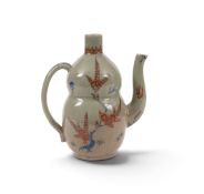 A rare Japanese celadon ground double gourd ewer, mid 17th century, painted in the Kakiemon palette 