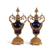 A large pair of French Sèvres-style ormolu-mounted porcelain vases, 19th century, the ogee forms dec
