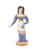 A rare Chamberlain's Worcester figure of a girl, c.1830, standing with her left hand in the pocket o