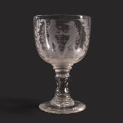A large commemorative glass goblet of pugilist interest, dated 1824, the rounded bowl well engraved 