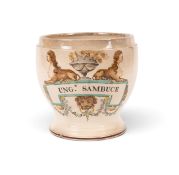 A creamware apothecary jar, c.1800, painted with a turquoise-edged cartouche inscribed 'Ungt. Sambuc