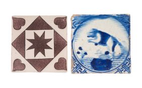 An early delftware tile, c.1650, possibly Pickleherring, painted in a rich blue with a leaping dog o