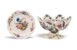 A Nove di Bassano faïence monteith, 19th century, the moulded form painted with bold flower sprays, 