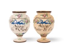 A pair of Italian creamware syrup jars, early 19th century, each inscribed in manganese with 'Sirop 