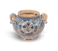 A rare Portuguese faïence posset pot, mid 17th century, possibly made for the German market, the squ