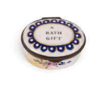 An English enamel commemorative patch box, c.1790, decorated with an oval band of blue lappets centr