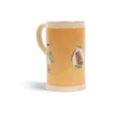 A tall Staffordshire creamware commemorative mug, c.1782, the slender form sprigged with standing po