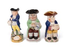 A Walton Toby jug, c.1810-20, wearing a green coat over a patterned waistcoat, moulded mark to the u