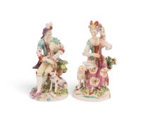 A pair of Derby figures of musicians, c.1760, each seated, he with a dog and playing the bagpipes, s