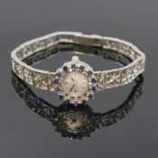 TISSOT Damenarmbanduhr in WG 585/000 mit Saphiren, Schweiz