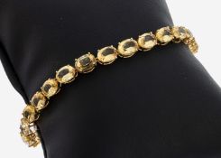 14 kt Gold Citrin-Armband, GG 585/000, 24 ovalfacett.