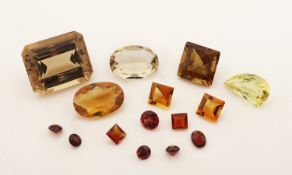 Lot 15 lose Citrine und Granate zus. ca. 37.69ct, versch.