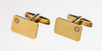 Paar 14 kt Gold Diamant-Manschettenknöpfe, GG 585/000,