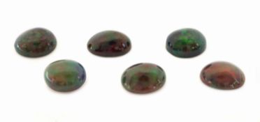 6 lose Schwarzopale, 20.71 ct, ovale Cabochonsin versch.
