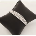 18 kt Gold Brillant-Armband, WG 750/000, z.T. sat. und