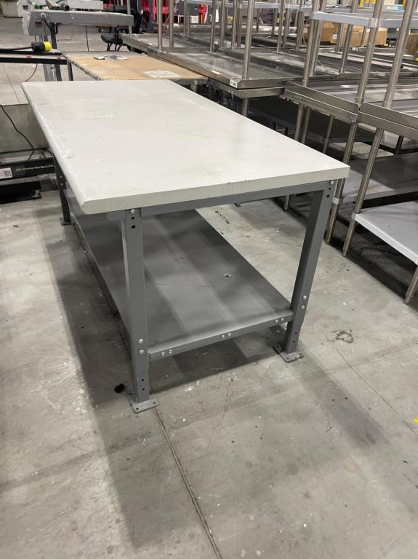 Lot of (34) Steel Work Tables. HIT# 2551084. Warehouse. Asset Located ...