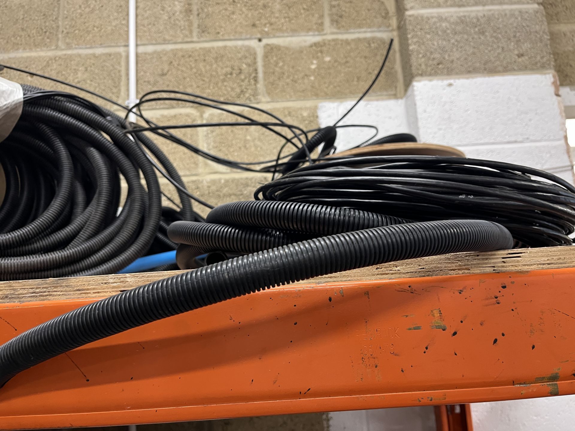 Contents of Racking Comprising a Quantity of Miscellaneous Items to Include Cable, Batteries - Image 7 of 11