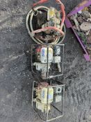 2: , 2: Water Pumps and 1: Concrete Vibratory Compaction Unit (Not Seen Running)