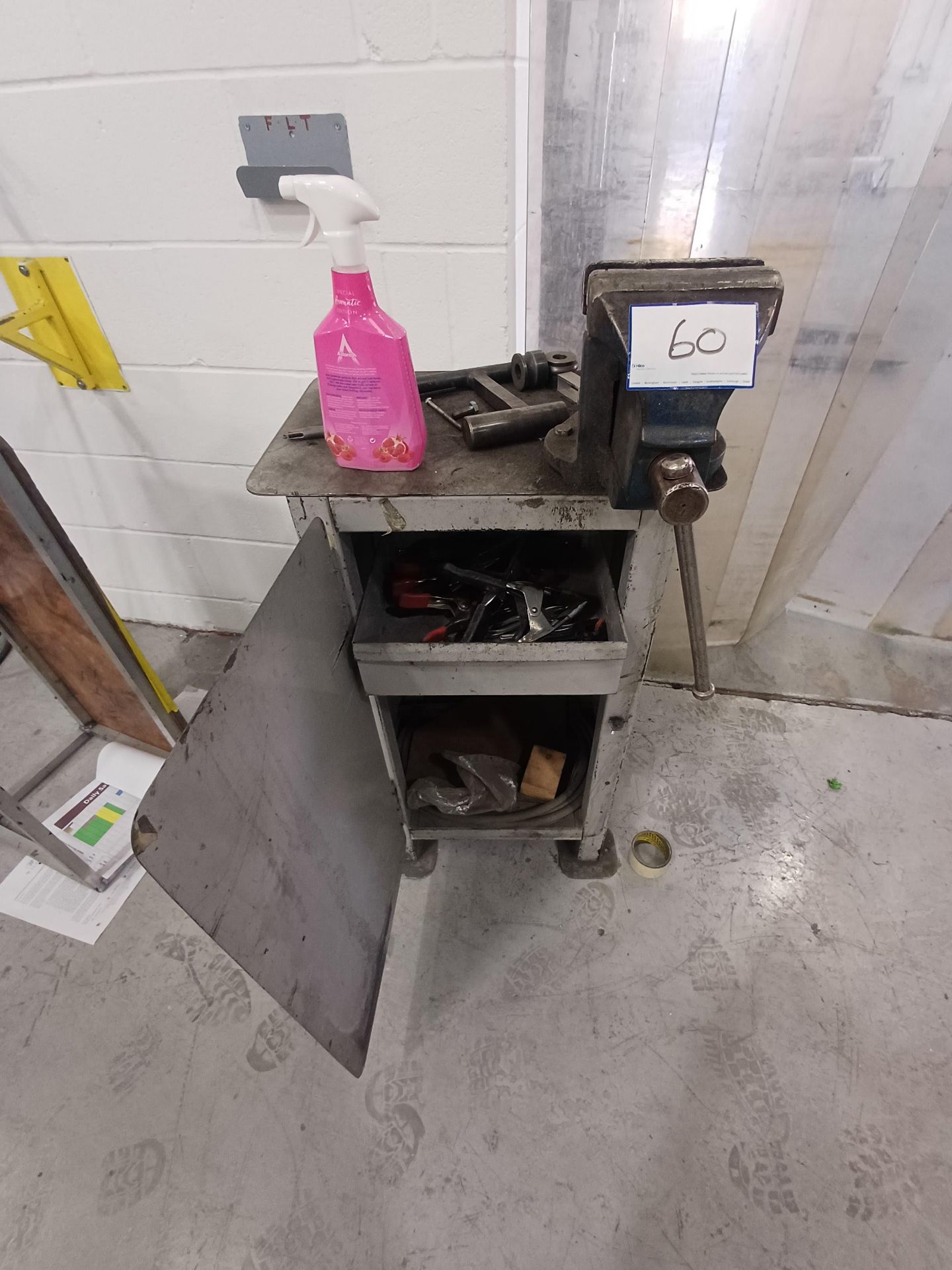 1, Record No.6 6 Inch vice on metal storage cupboard