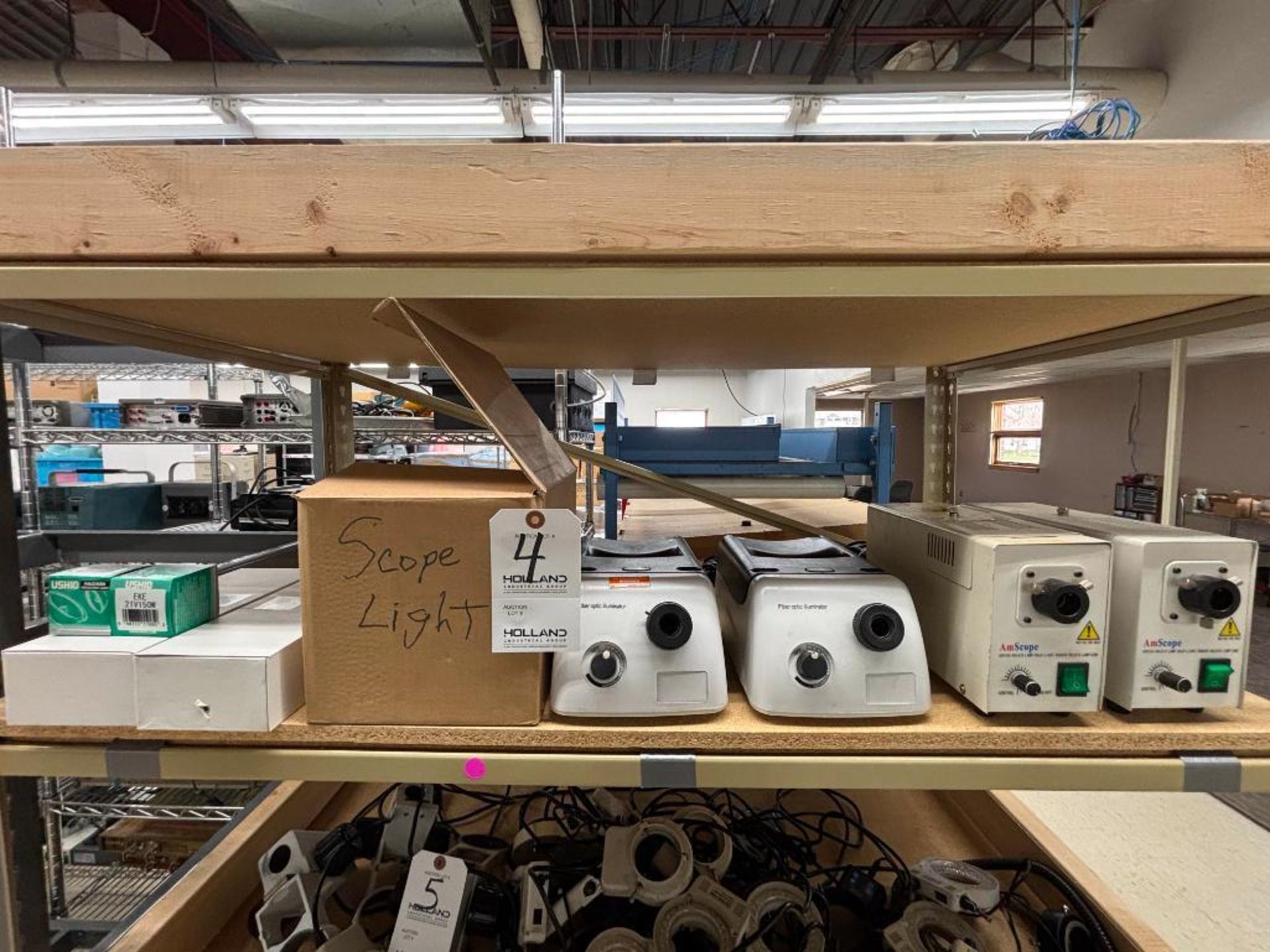 (2) AM Scopoe Lights, (3) Fiber Optic Illumiators, (One is Unused in Box), (18) Halogen Reflector La