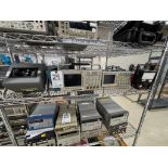 (1) Megohmeter, (2) Tektronix Oscilloscopes, (1) Simpson Tester