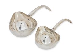 A GRADUATED PAIR OF TURKISH SILVER LADLES