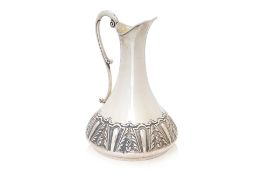 A FOLIATE SILVER JUG