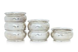 A SET OF SIX STERLING SILVER BOWLS