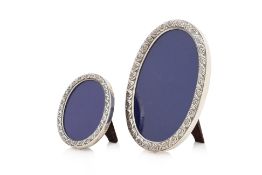 TWO OVAL STERLING SILVER PHOTOGRAPH FRAMES
