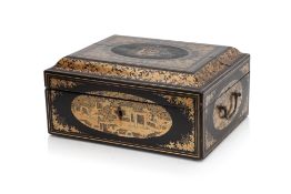 A GILT AND BLACK LACQUER BOX