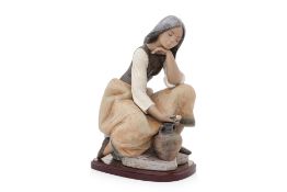 A LARGE LLADRO 'WATER CARRIER' PORCELAIN FIGURE