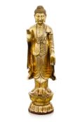 A LARGE CARVED GILT WOOD BUDDHA