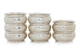 A SET OF EIGHT STERLING SILVER BOWLS