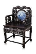 A MOTHER OF PEARL INLAID AND PORCELAIN BACK HARDWOOD CHAIR
