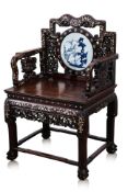 A MOTHER OF PEARL INLAID AND PORCELAIN BACK HARDWOOD CHAIR