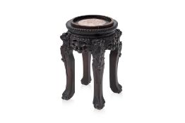 A MARBLE INSET HARDWOOD STAND