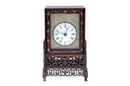 A CHINESE HARDWOOD TABLE CLOCK