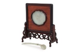 A CELADON JADE HAIR PIN AND A JADE INSET HARDWOOD TABLE SCREEN