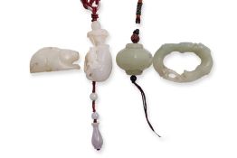 A GROUP OF FOUR JADE CARVINGS