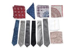 A GROUP OF DESIGNER TIES AND POCKET SQUARES