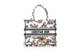 CHRISTIAN DIOR - A FLORAL EMBROIDERED BOOK TOTE BAG