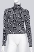 PRADA - A BLACK AND WHITE FLORAL PATTERNED TURTLENECK JUMPER