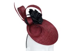 PHILIP TREACY - A BURGUNDY FASCINATOR WITH EMBELLISHED BLACK ROSE