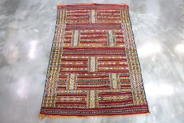 A TRIBAL KILIM WOOL RUG
