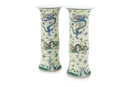 A PAIR OF FAMILLE VERTE DRAGON-DECORATED BEAKER VASES