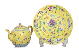 A YELLOW GROUND FAMILLE ROSE TEAPOT AND DISH