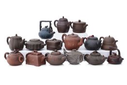 A GROUP OF 15 YIXING ZISHA TEAPOTS