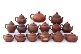 A GROUP OF 15 YIXING POTTERY TEAPOTS