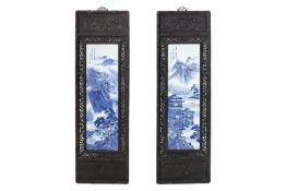 A PAIR OF BLUE AND WHITE PORCELAIN PANELS