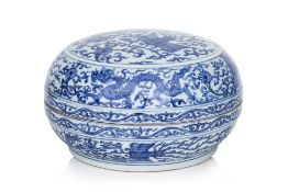 A BLUE AND WHITE CIRCULAR BOX AND COVER